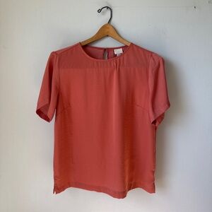 A new day, salmon colored blouse
